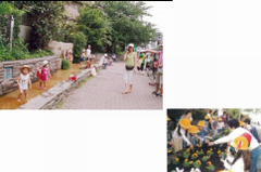 せせらぎと絵陶板のある烏山川緑道の写真